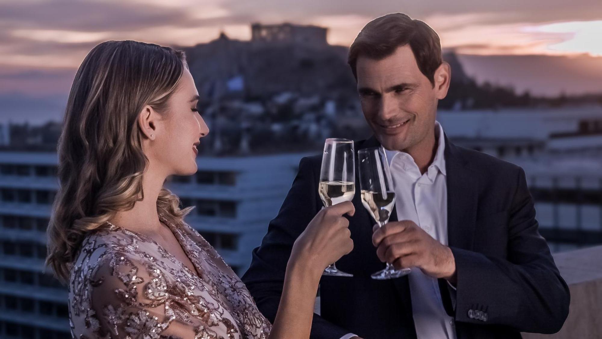 Njv 아테네 플라자 호텔 외부 사진 A couple toasting with champagne